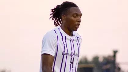 UCA forward Tajio James walks downfield after a blocked shot in the first half of Tuesday night's game.