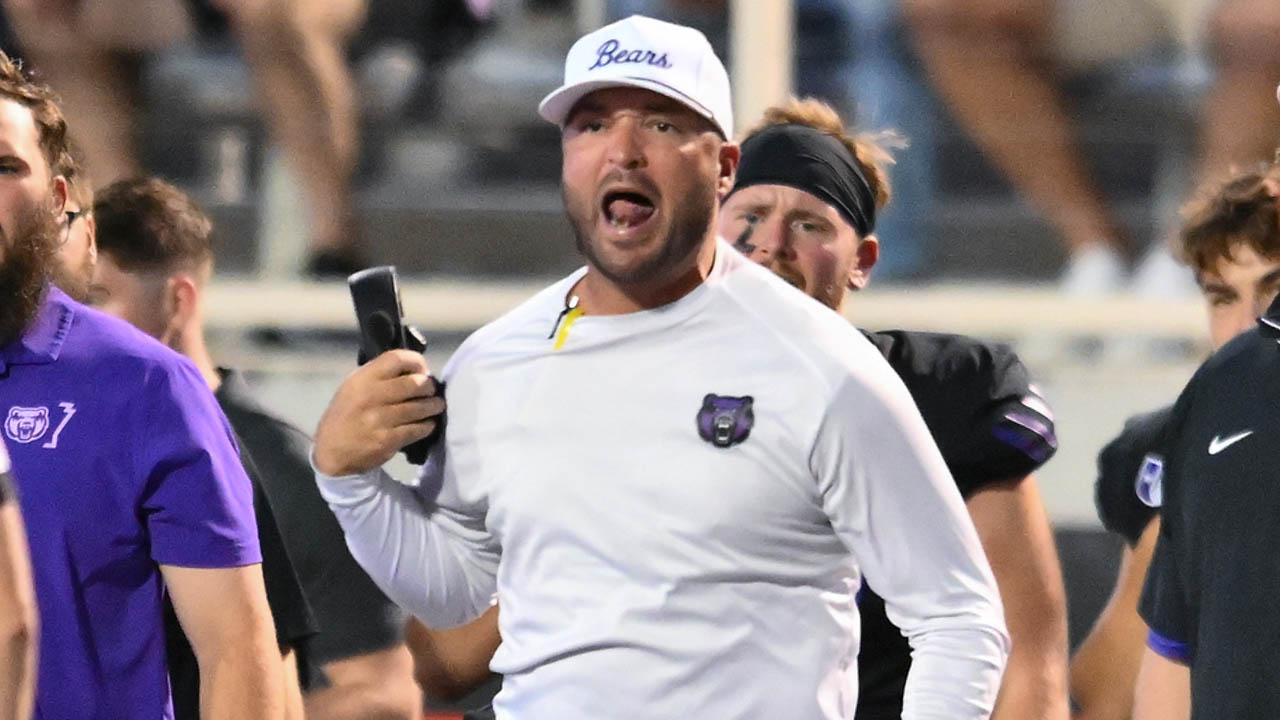 Nathan Brown on sidelines against Lamar