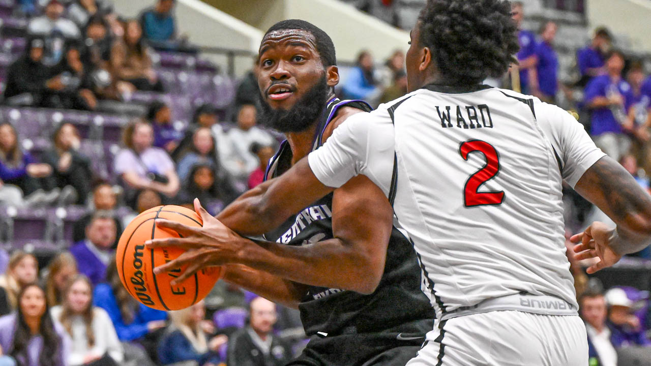 UCA forward Michael Evbagharu driving against Southeast Missouri at the Farris Center