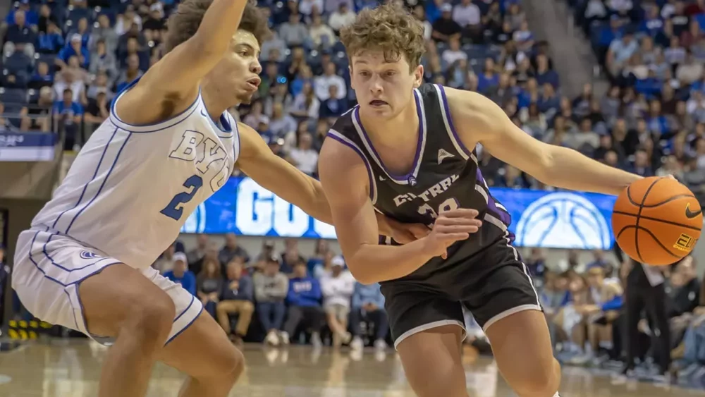 Bears Layne Taylor drives against Western Illinois