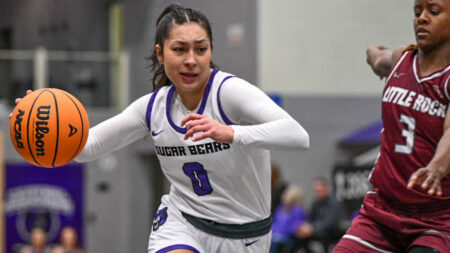 UCA Sugar Bears' Jade Upshaw drives the lane against the Little Rock Trojans