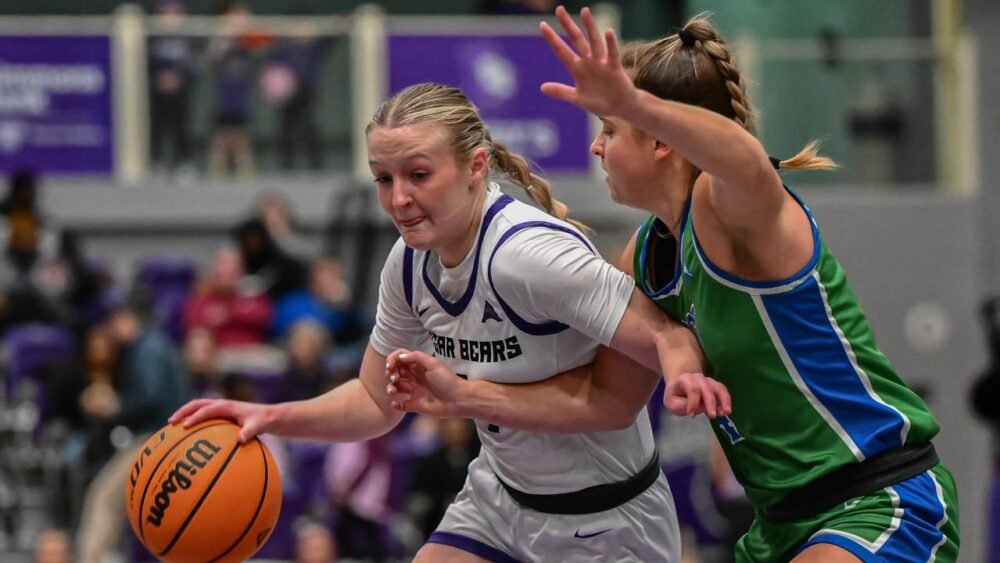 UCA Sugar Bears Kinley Fisher drives against Florida Gulf Coast