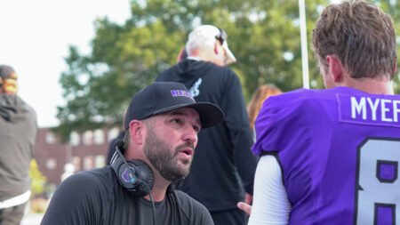 UCA Bears quarterback Nathan Brown talking with quarterback Austin Myers against Utah Tech
