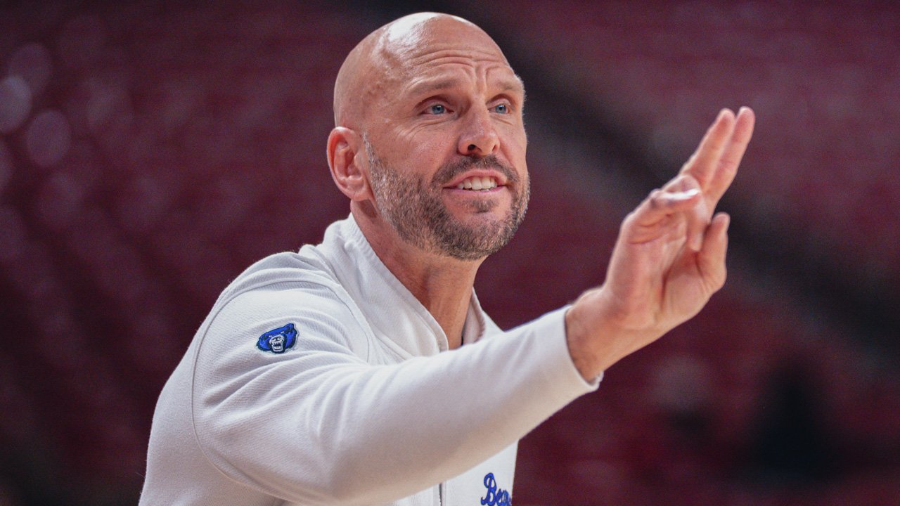 UCA Sugar Bears coach Tony Kemper on the sidelines during game with the Arkansas Razorbacks