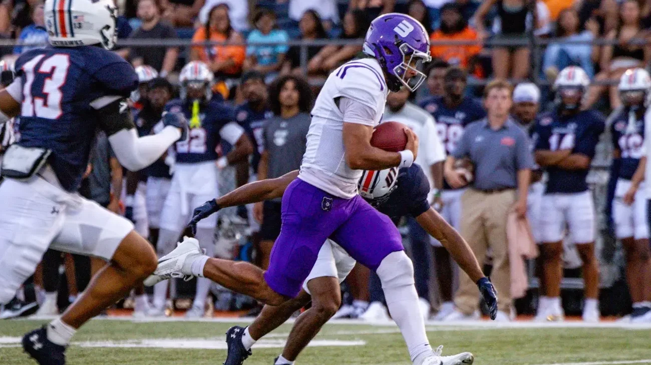 UCA quarterback Donovyn Omolo scrambles during season-opener against UT Martin