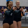 UCA volleyball players during match against Denver.