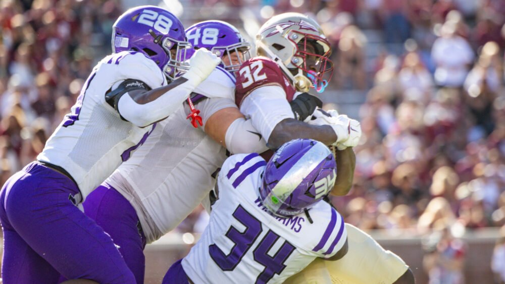 UCA Bears defenders tackle Florida State runner in game at Doak Walker Stadium in Tallahassee, Fla.